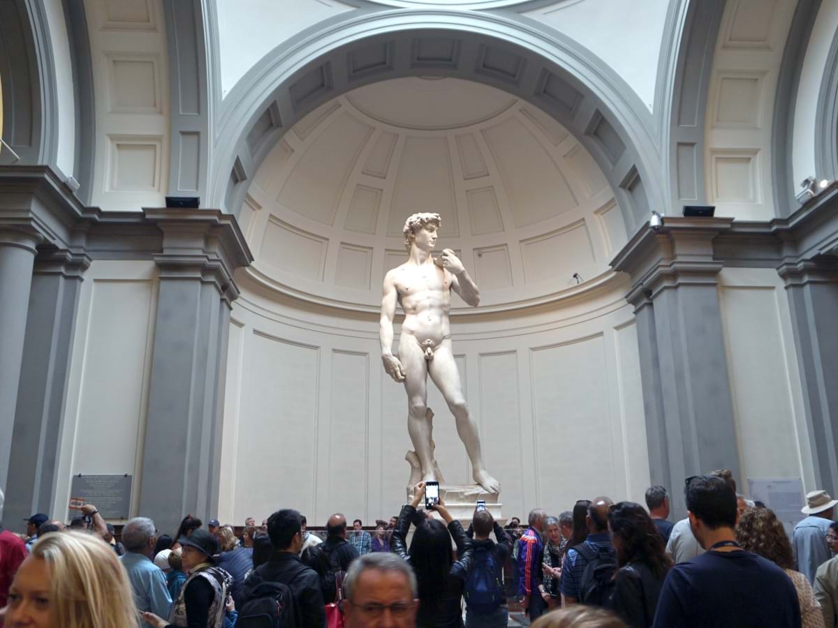 Art fans and tourists alike visiting the Statue of David