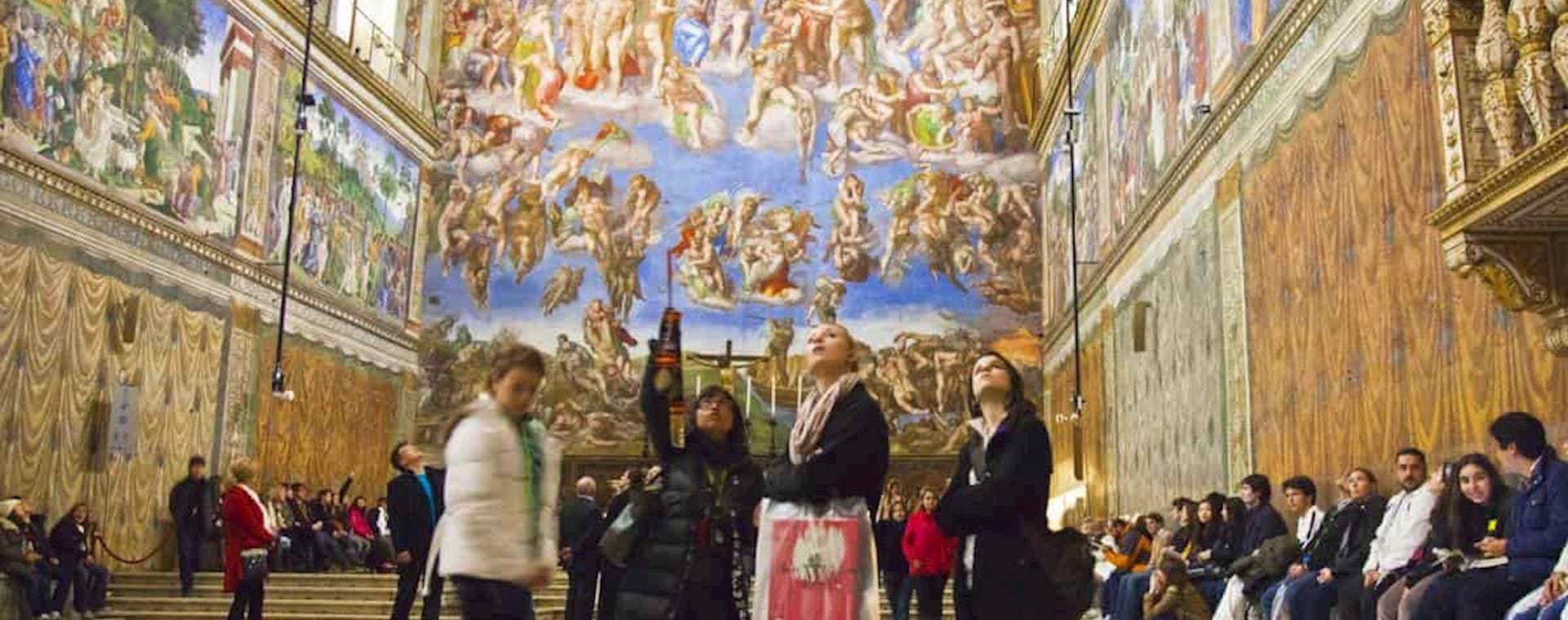 Tourists visiting the Sistine Chapel
