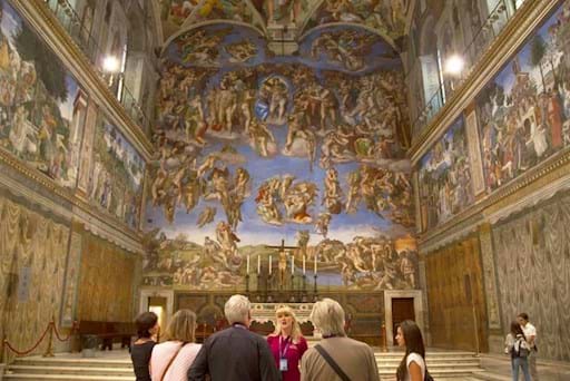 Tourists visiting the Sistine Chapel with a early entrance access