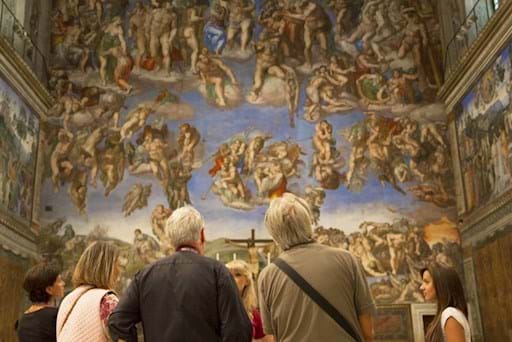 People admiring the Sistine Chapel